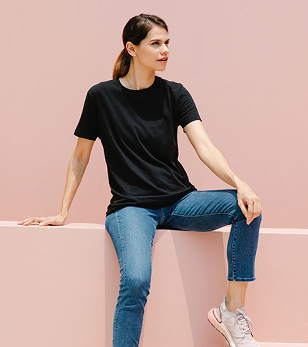woman-casual-black-shirt-sitting-short